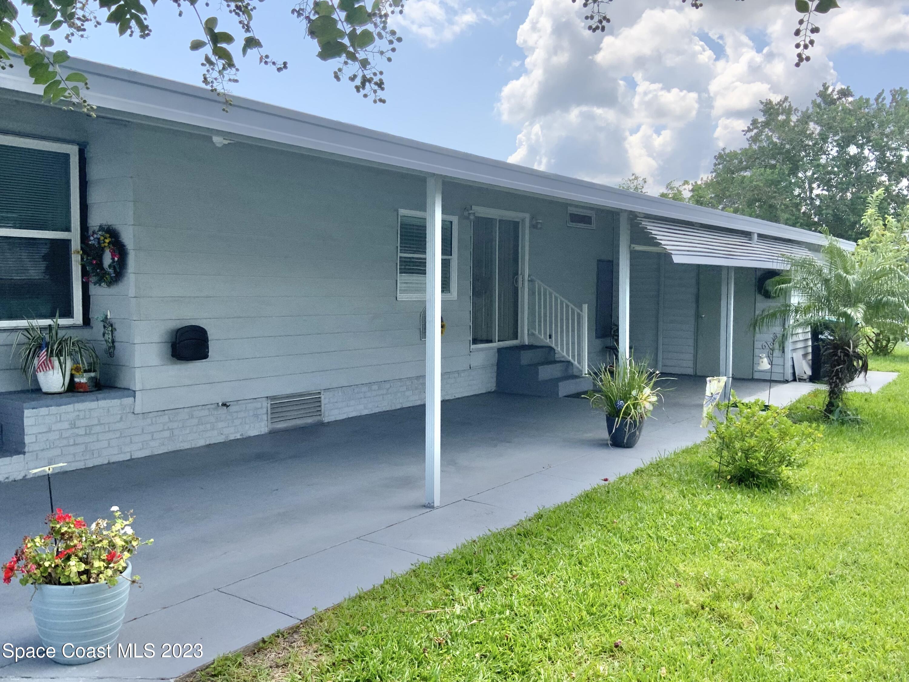 2310 Coconut Palm Drive Palm Bay, FL 32905 - Photo 5 of 22 IMG_4356