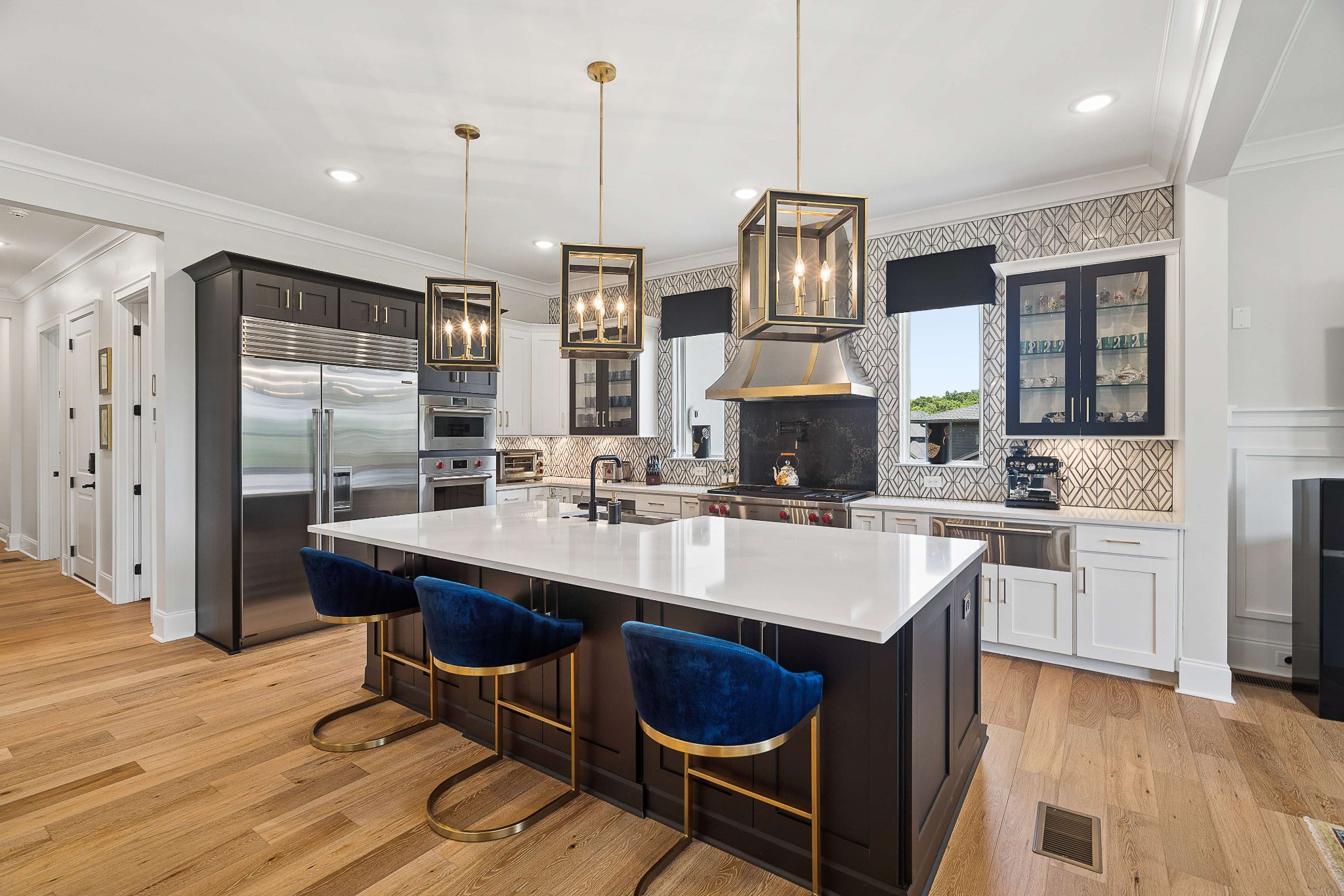 6004 Lookaway Circle Franklin, TN 37067 - Photo 22 of 71 a kitchen with kitchen island granite countertop a sink appliances and cabinets