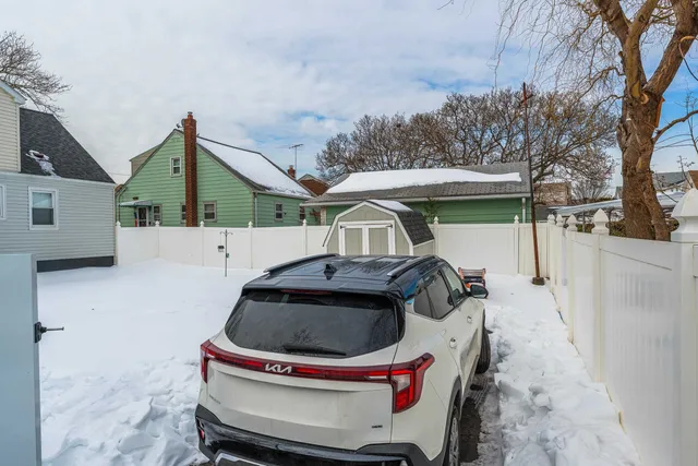 a car parked in front of a house