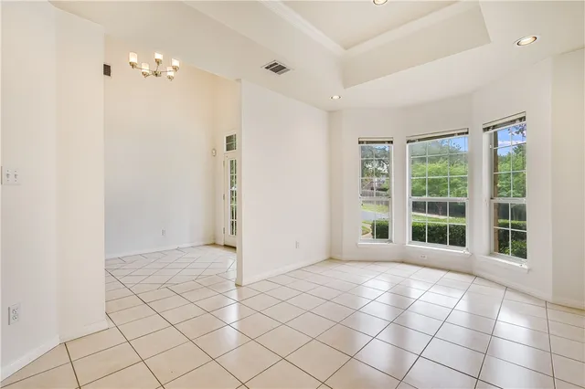 a view of a room with a large window