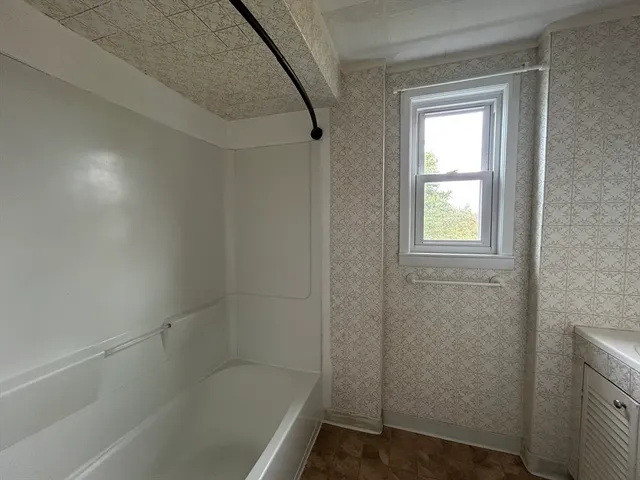 a bathroom with a bathtub