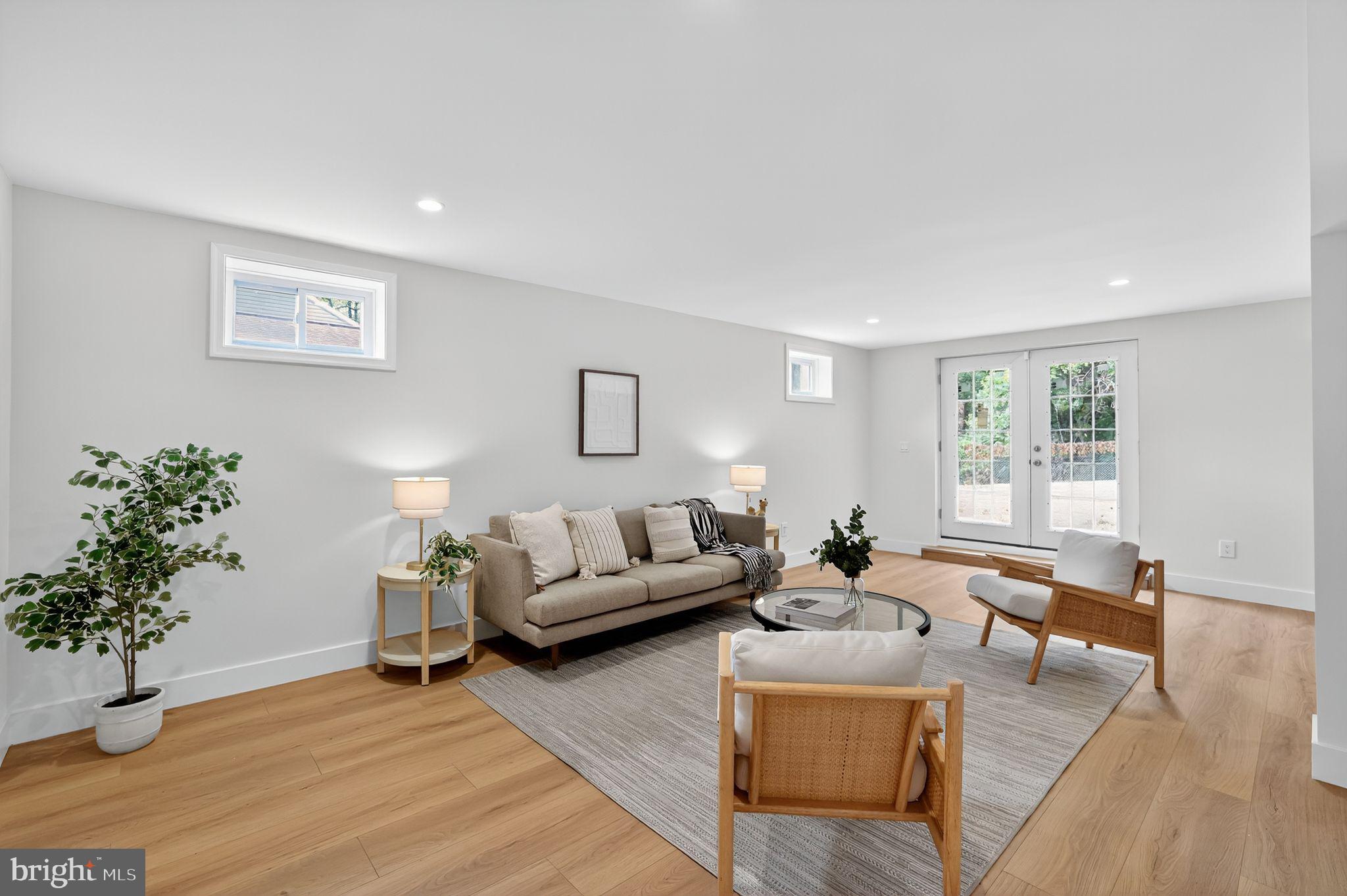 3428 Beret Lane Silver Spring, MD 20906 - Photo 29 of 33 a living room with furniture and a large window