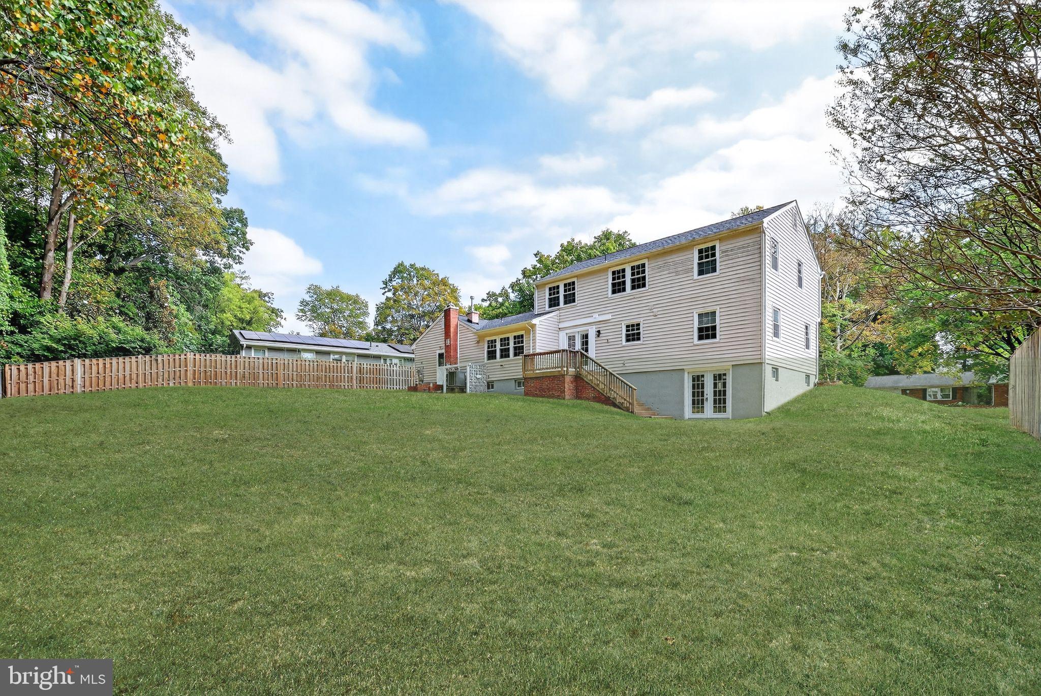 3428 Beret Lane Silver Spring, MD 20906 - Photo 32 of 33 a view of a house with backyard and garden