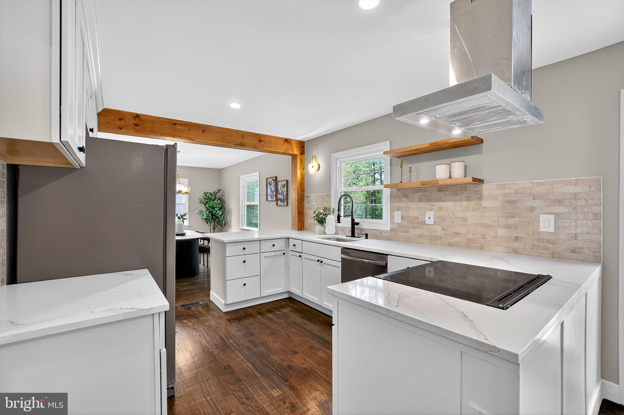 3428 Beret Lane Silver Spring, MD 20906 - Photo 8 of 33 a kitchen that has a sink and a stove in it