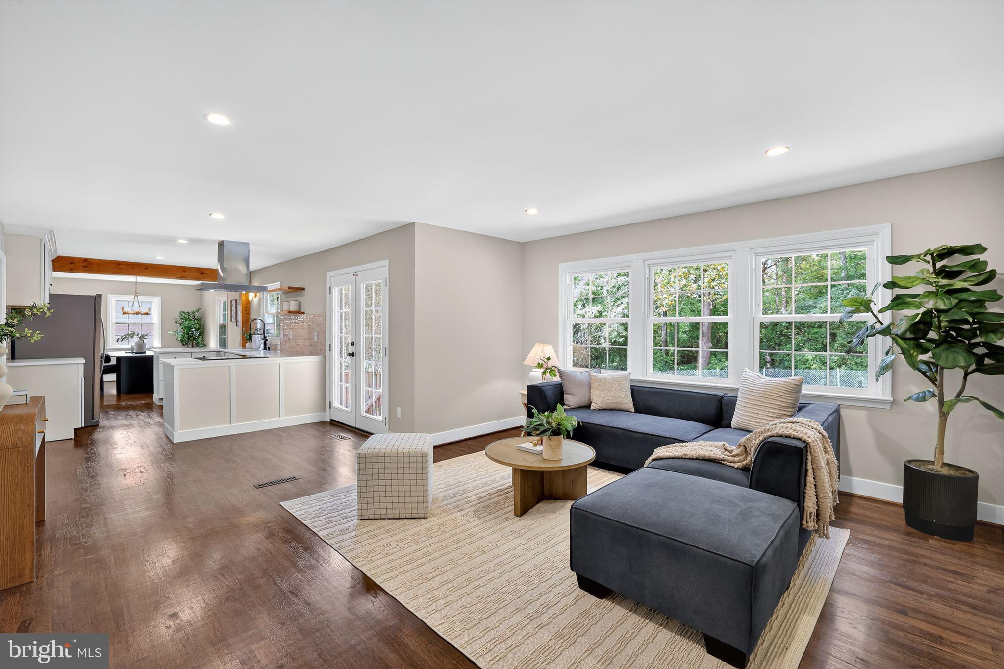3428 Beret Lane Silver Spring, MD 20906 - Photo 10 of 33 a living room with furniture and a large window