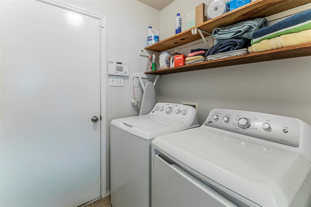 3433 Charing Cross Road Midlothian, TX 76065 - Photo 23 of 27 a utility room with dryer and washer