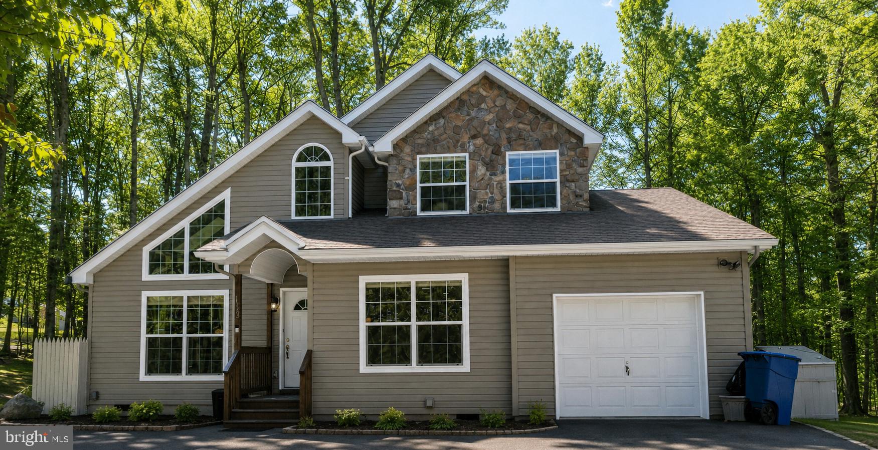 1122 Ranger Trail Pocono Lake, PA 18347 - Photo 1 of 48 Charming home nestled in lush greenery.