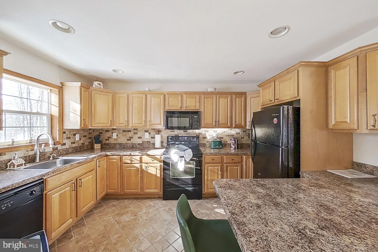 1122 Ranger Trail Pocono Lake, PA 18347 - Photo 11 of 48 Warm and inviting kitchen space.