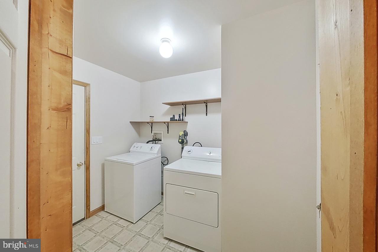 1122 Ranger Trail Pocono Lake, PA 18347 - Photo 27 of 48 Bright and functional laundry space.
