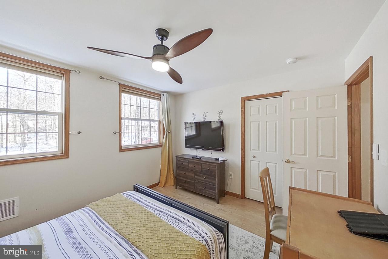 1122 Ranger Trail Pocono Lake, PA 18347 - Photo 37 of 48 Bright and airy bedroom retreat.