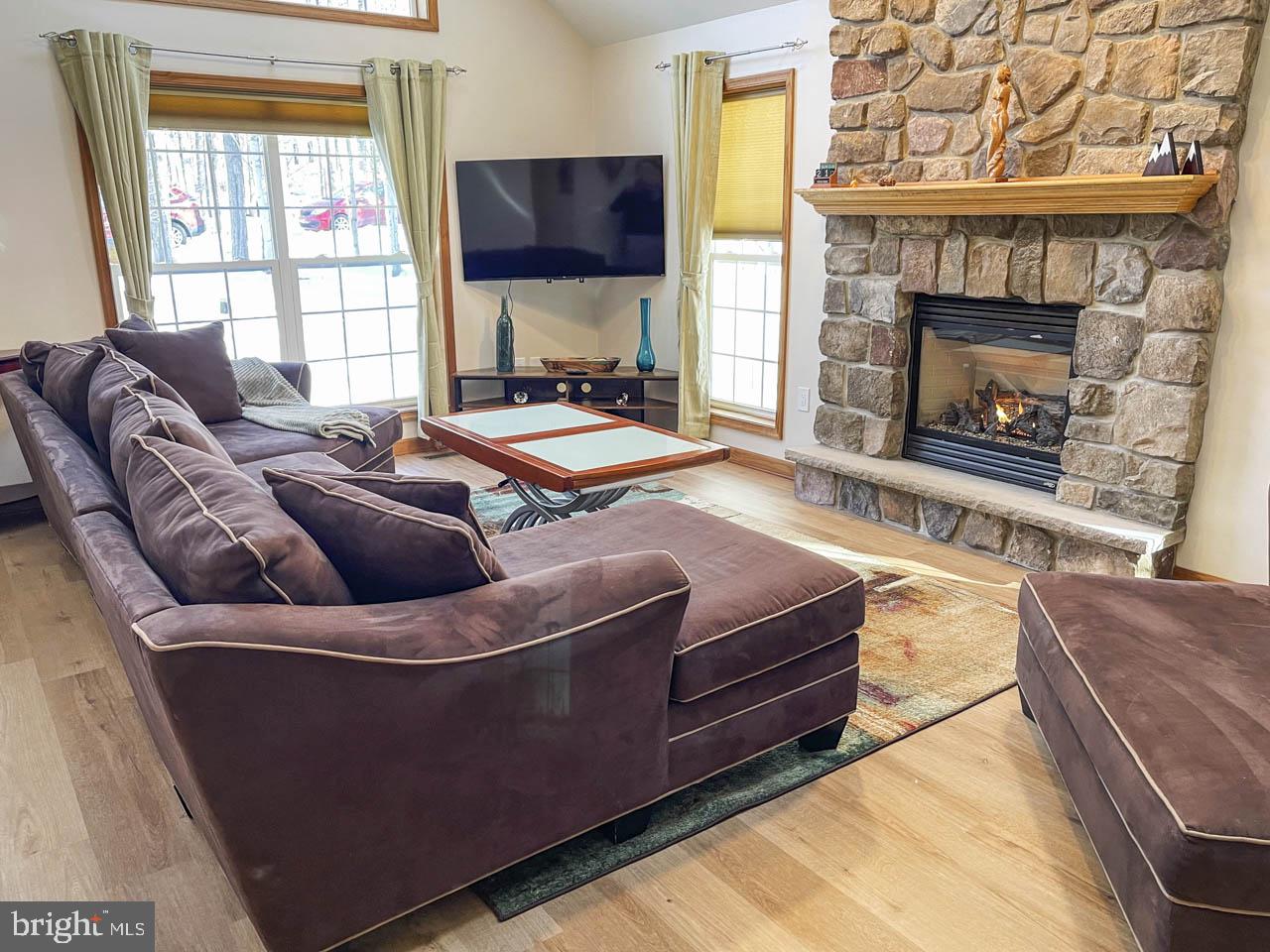 1122 Ranger Trail Pocono Lake, PA 18347 - Photo 5 of 48 Cozy retreat with stone fireplace.