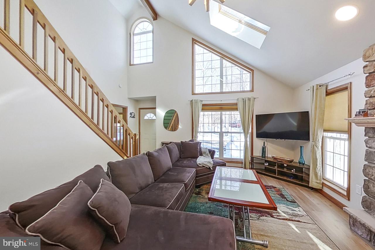 1122 Ranger Trail Pocono Lake, PA 18347 - Photo 7 of 48 Bright and airy living space awaits.