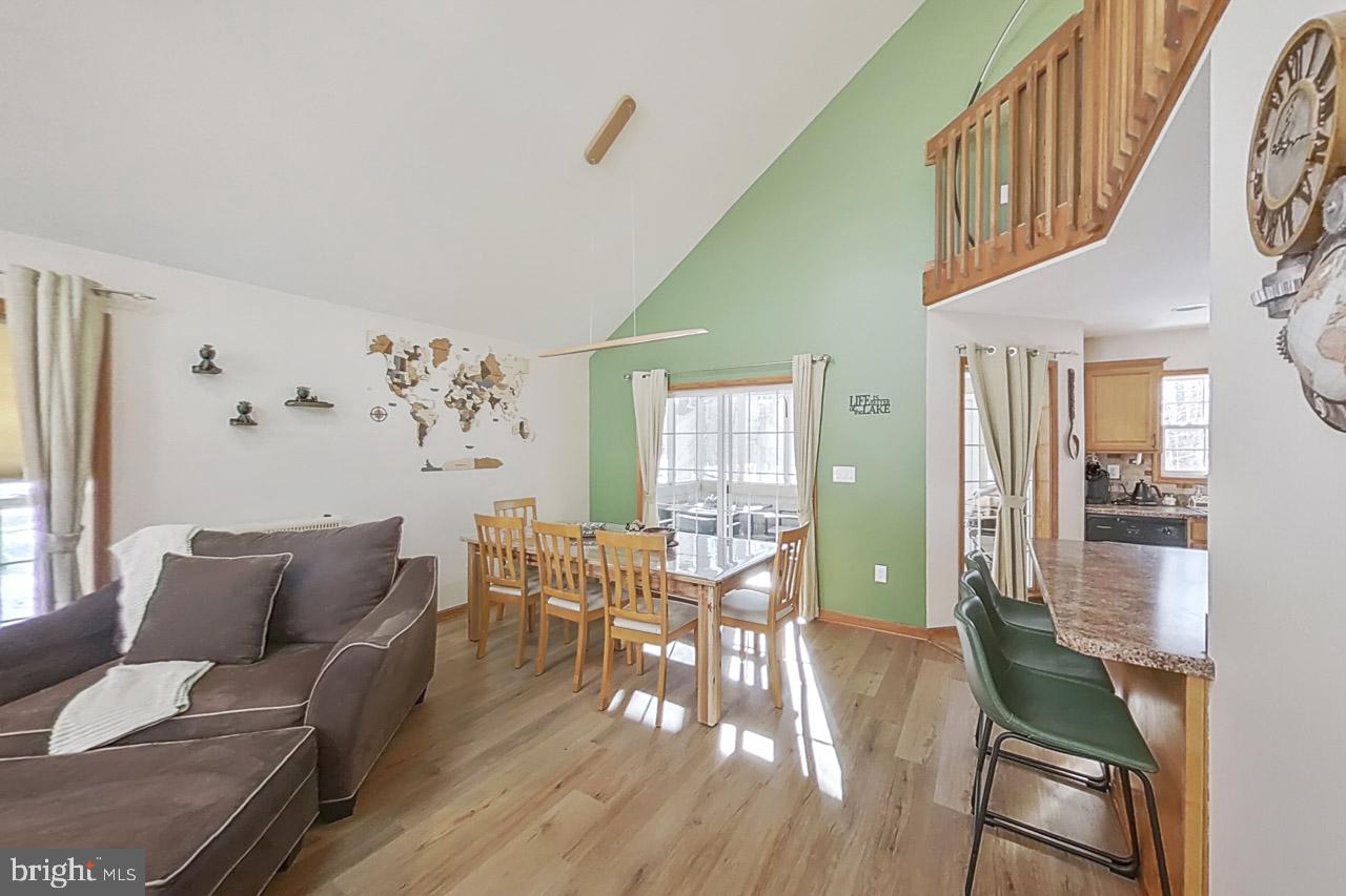 1122 Ranger Trail Pocono Lake, PA 18347 - Photo 9 of 48 Bright and airy open living space.