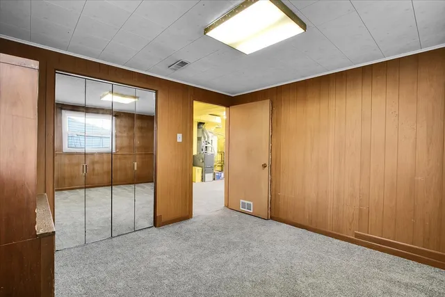 an empty room with sliding door