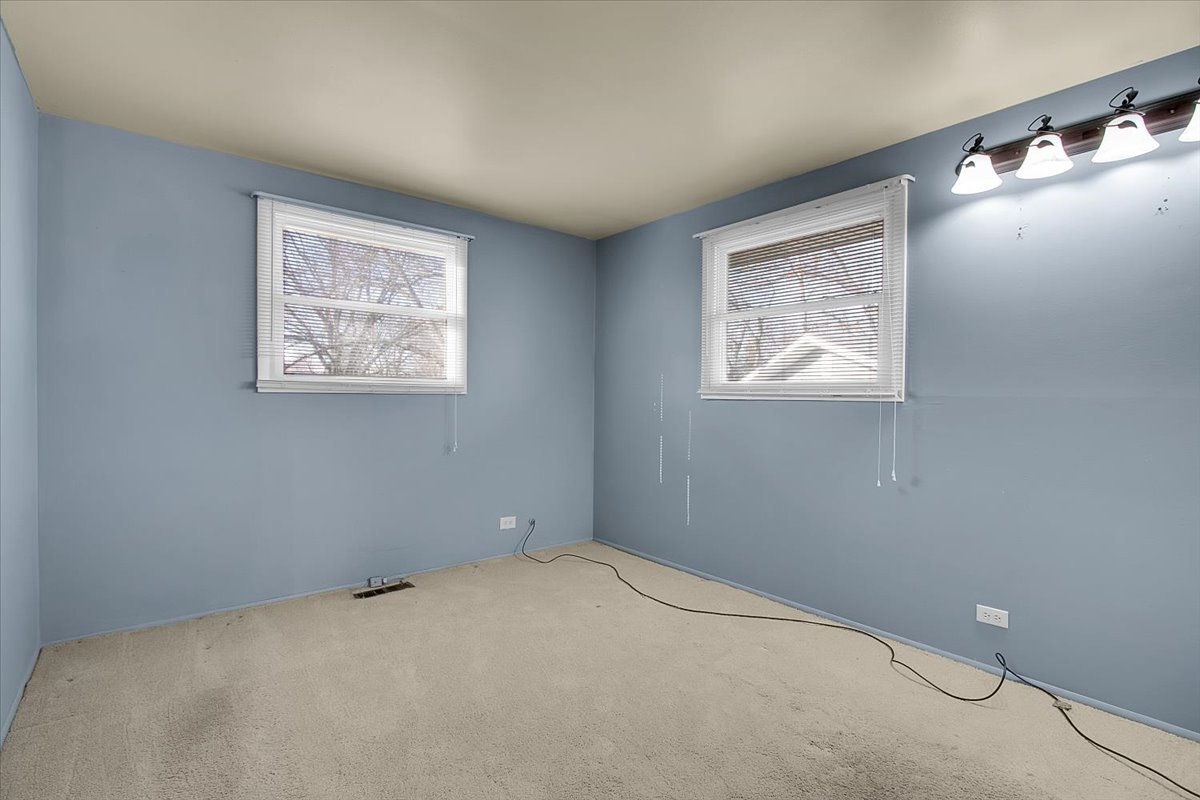 426 Thunderbird Trail Carol Stream, IL 60188 - Photo 28 of 34 a view of an empty room with a window