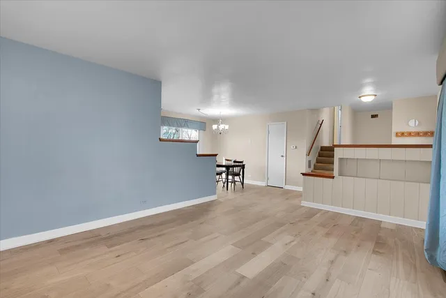 a view of a kitchen with a sink and a window