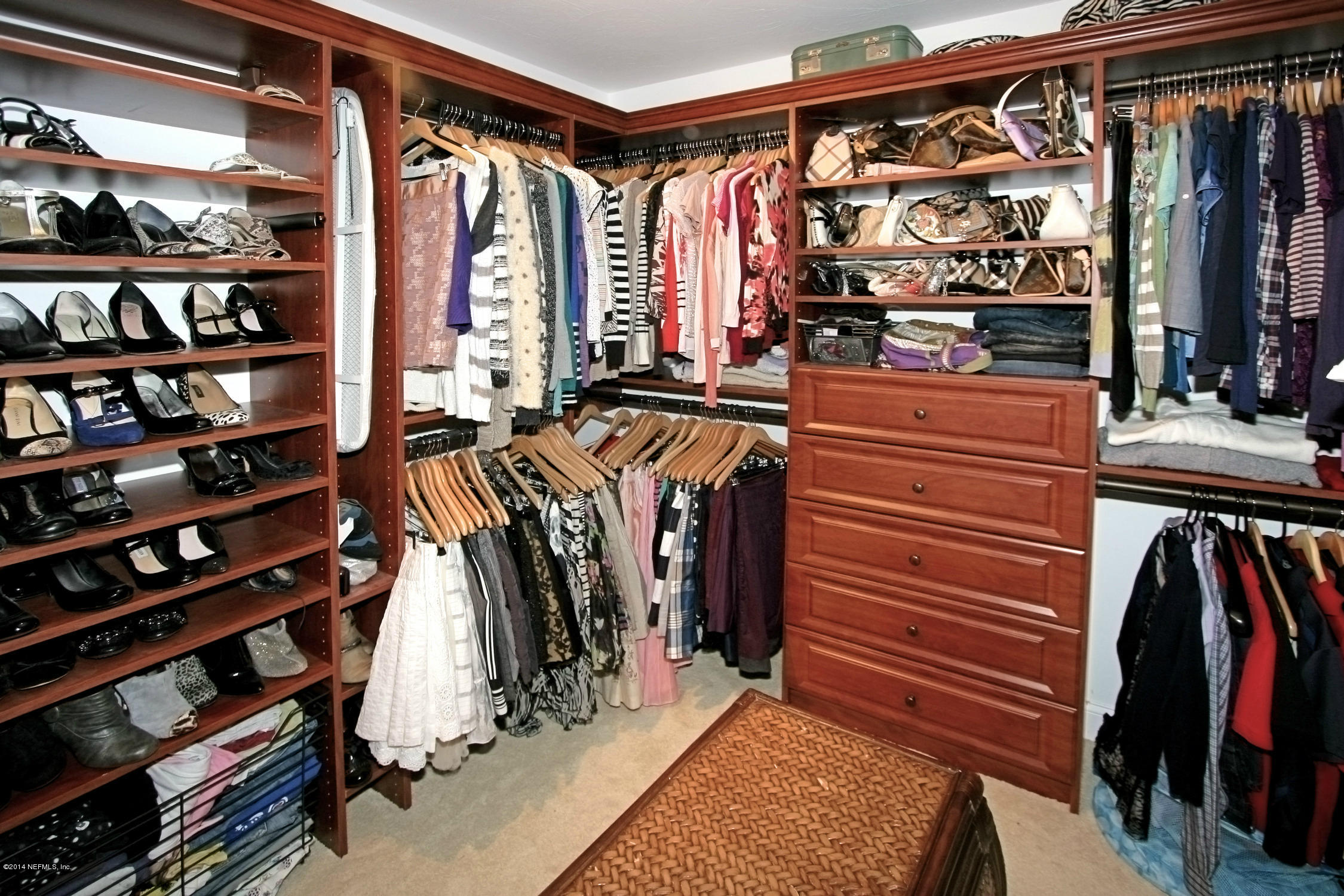 2740 Loretto Road Jacksonville, FL 32223 - Photo 12 of 29 a view of walk in closet with clothes and shoes