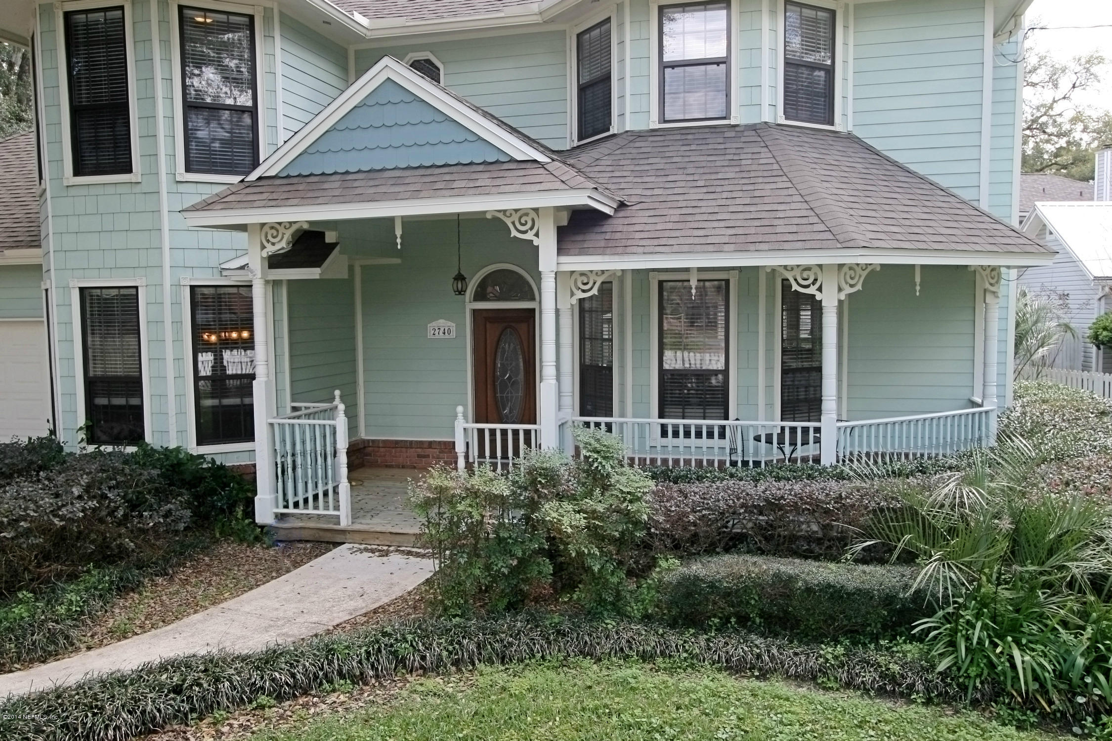 2740 Loretto Road Jacksonville, FL 32223 - Photo 21 of 29 front view of a house and a yard