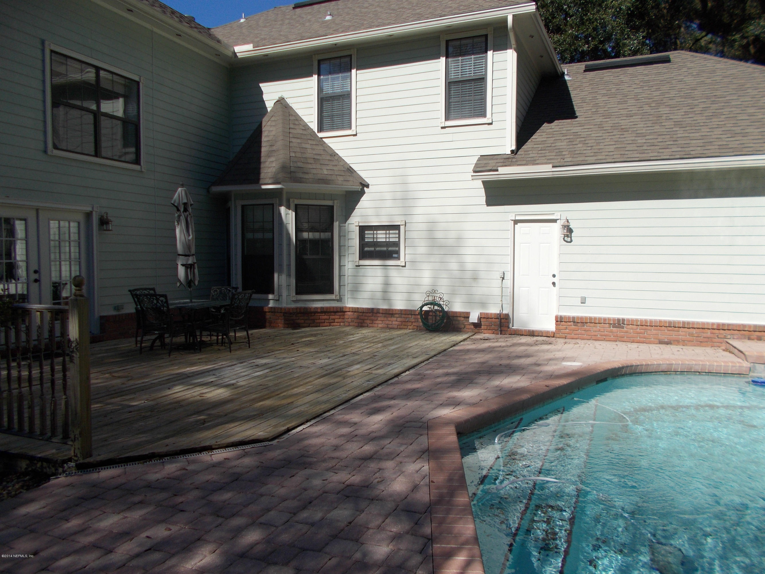 2740 Loretto Road Jacksonville, FL 32223 - Photo 24 of 29 front view of a house with a yard