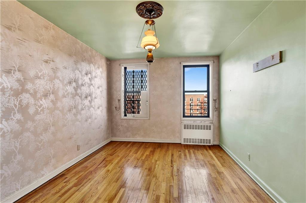2260 Burnett Street, Unit 6K Brooklyn, NY 11229 - Photo 12 of 17 a view of empty room with wooden floor