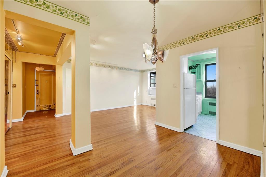 2260 Burnett Street, Unit 6K Brooklyn, NY 11229 - Photo 7 of 17 a view of a hallway with wooden floor