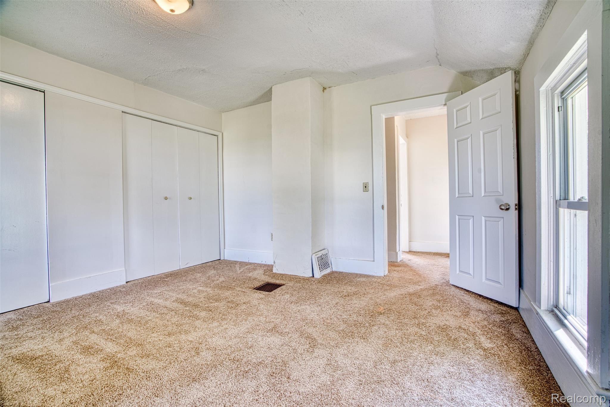 2980 Baseline Road Stockbridge, MI 49285 - Photo 20 of 28 Newer carpet upstairs and loads of natural light.