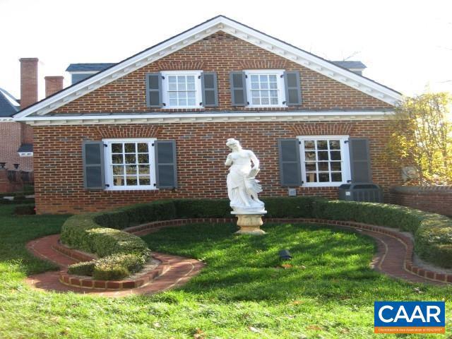 1920 Owensville Road, Unit B Charlottesville, VA 22901 - Photo 4 of 26 a front view of a house with a yard