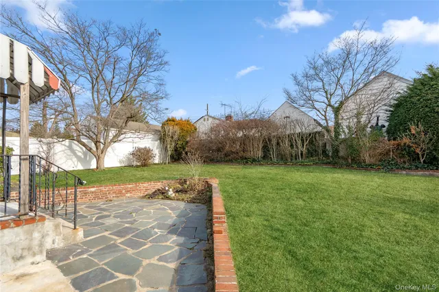 a view of a park with large trees