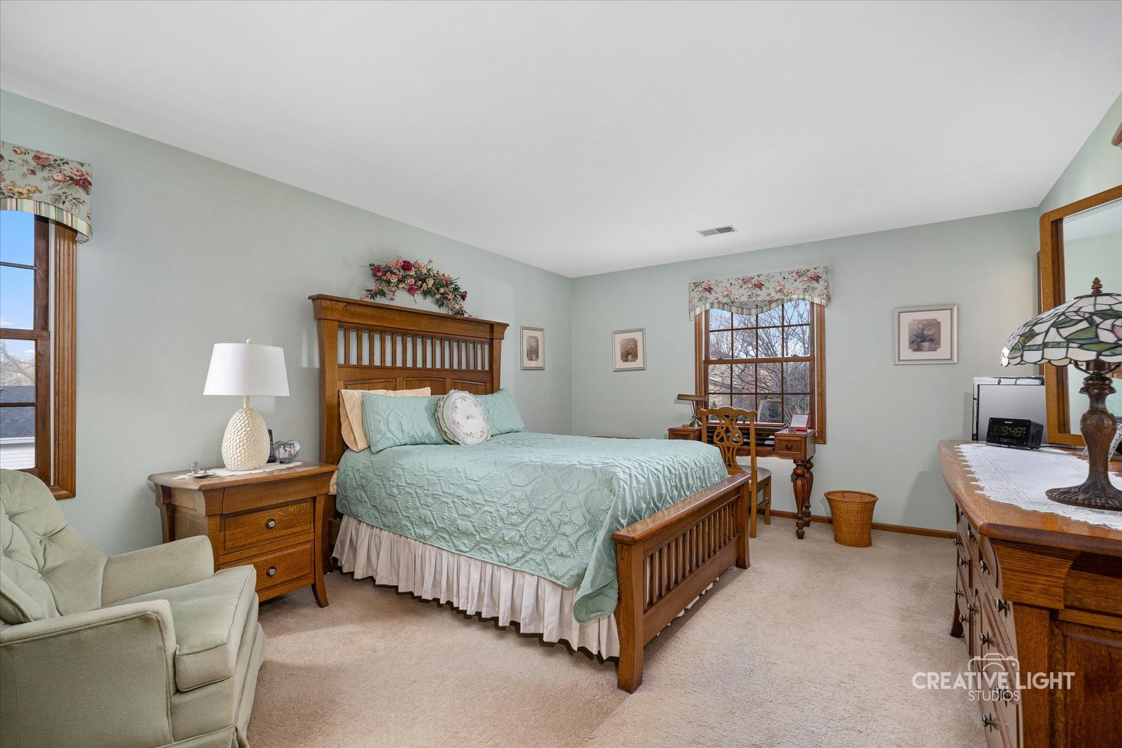 930 Appomattox Circle Naperville, IL 60540 - Photo 12 of 29 a bedroom with a bed and a table in it