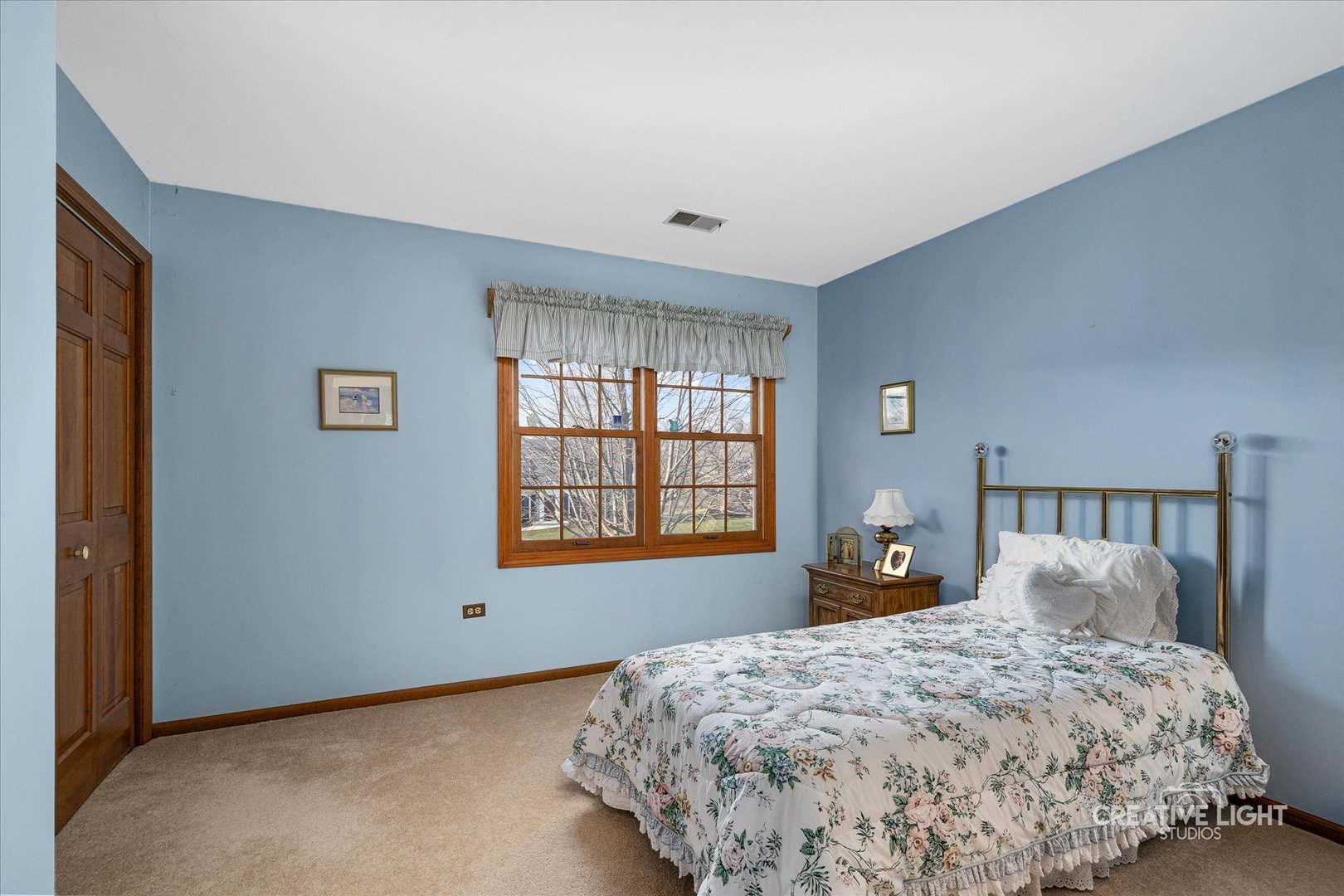 930 Appomattox Circle Naperville, IL 60540 - Photo 15 of 29 a bedroom with a bed and window