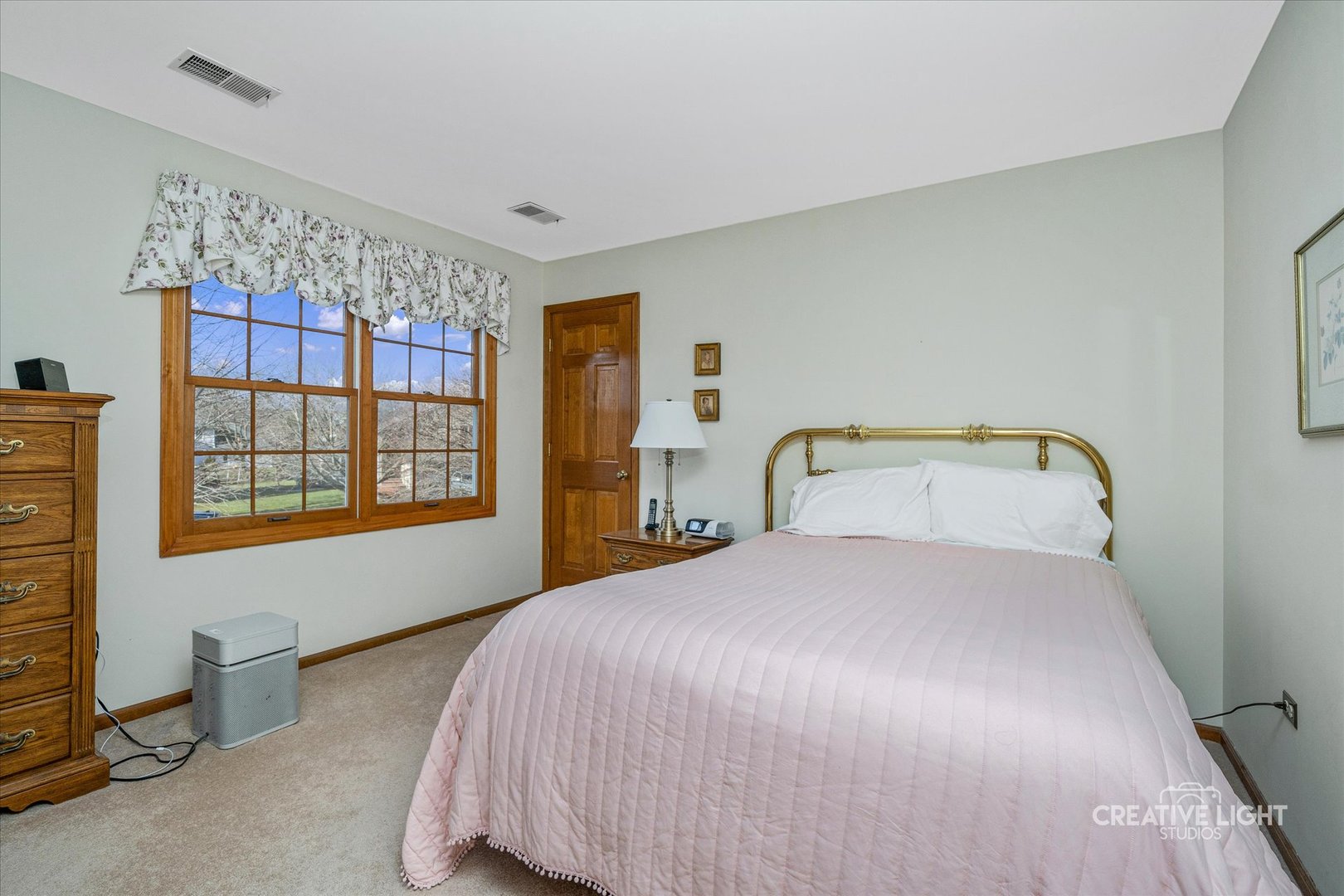 930 Appomattox Circle Naperville, IL 60540 - Photo 16 of 29 a bedroom with a bed and a window