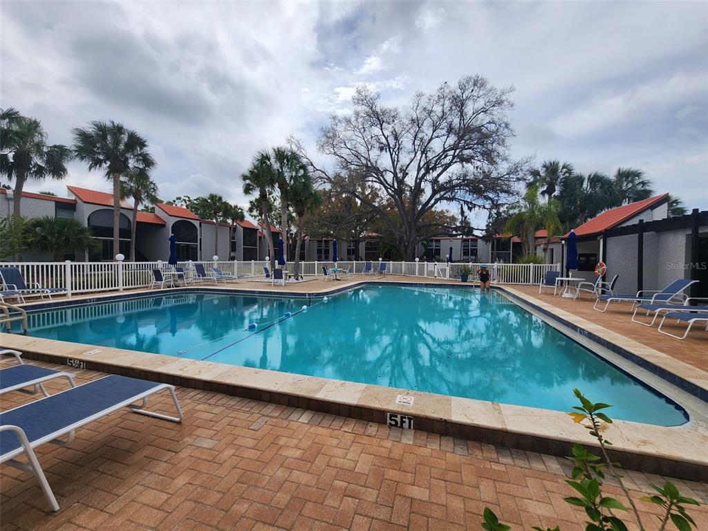 3249 South Beneva Road, Unit 204 Sarasota, FL 34232 - Photo 13 of 44 a view of a house with a yard
