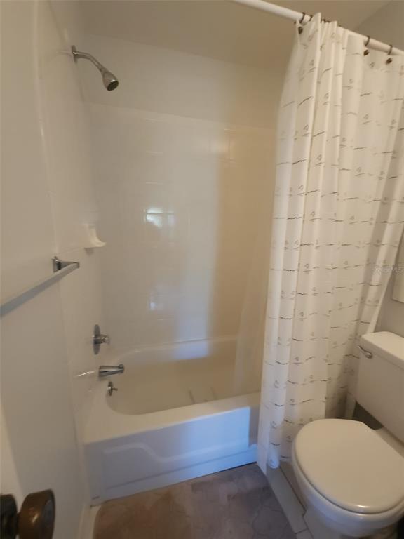 3249 South Beneva Road, Unit 204 Sarasota, FL 34232 - Photo 29 of 44 a white toilet sitting next to a bath tub