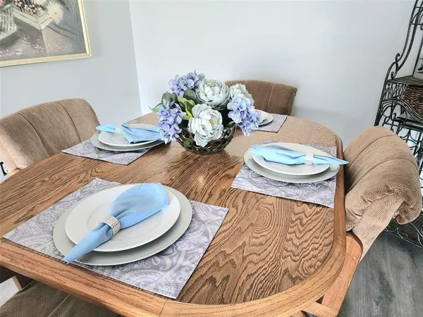 a kitchen with stainless steel appliances granite countertop a sink and cabinets