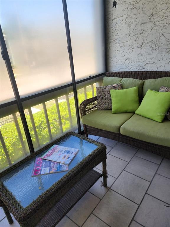 3249 South Beneva Road, Unit 204 Sarasota, FL 34232 - Photo 43 of 44 a living room with furniture and a window