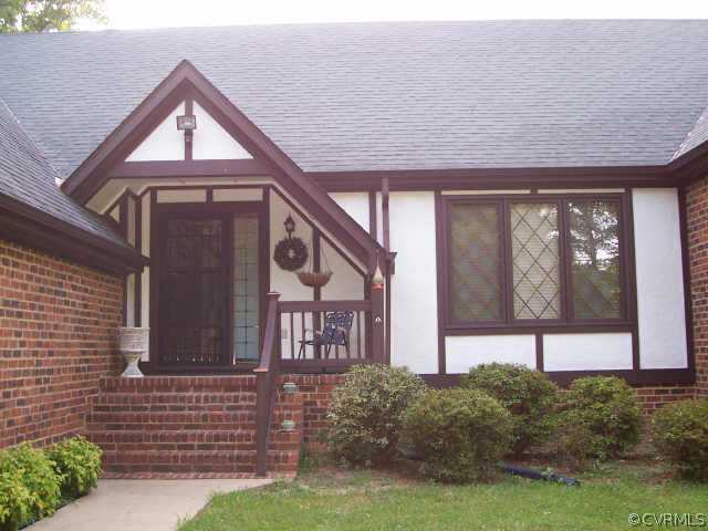 12518 2nd Branch Road Chesterfield, VA 23838 - Photo 2 of 8 a front view of a house with garden