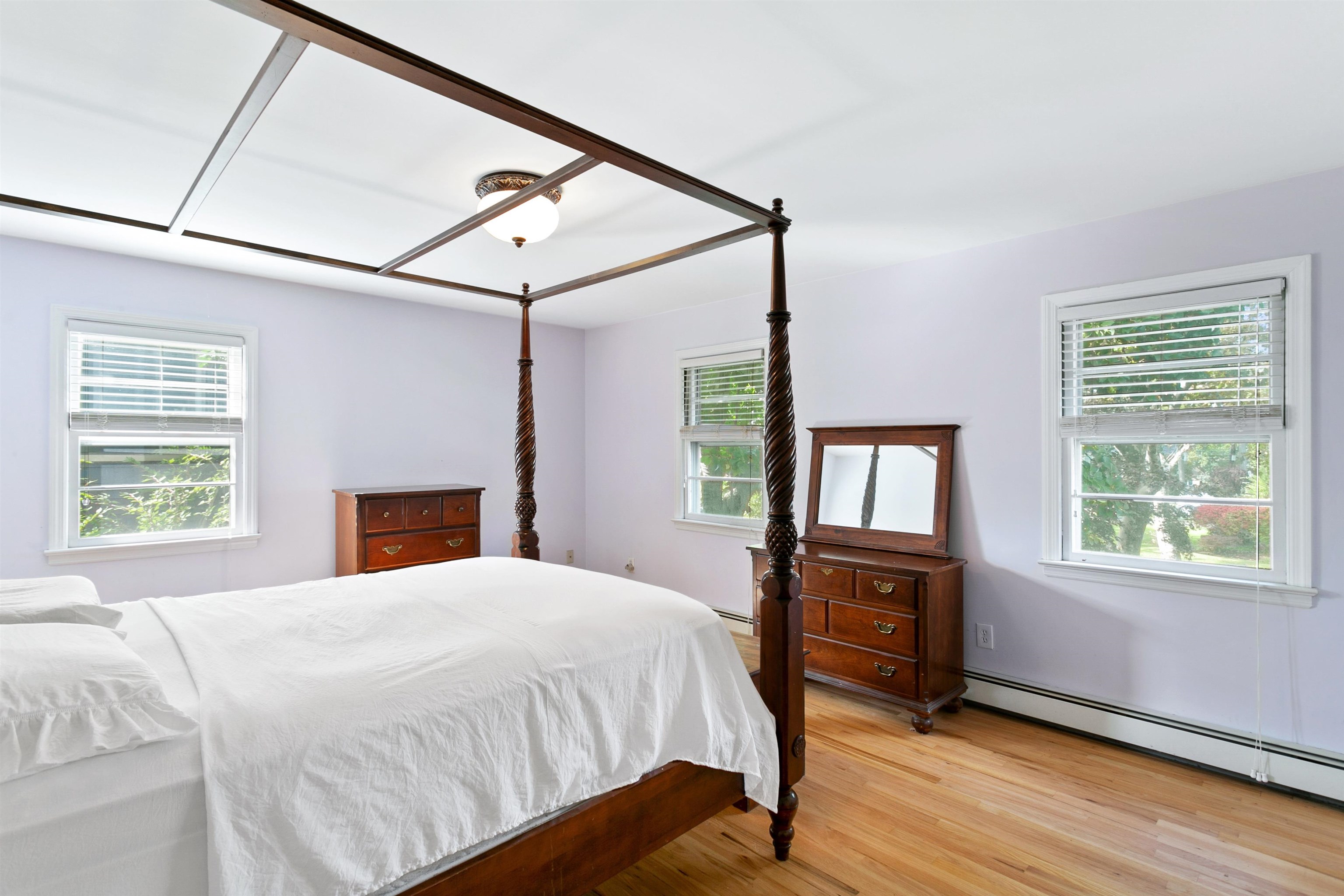39 Raymond Avenue Rutherford, NJ 07070 - Photo 10 of 15 a bedroom with a bed dresser and a window