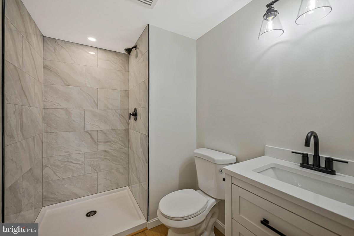 13304 Cherry Tree Crossing Road Brandywine, MD 20613 - Photo 18 of 32 Sleek modern bathroom retreat.