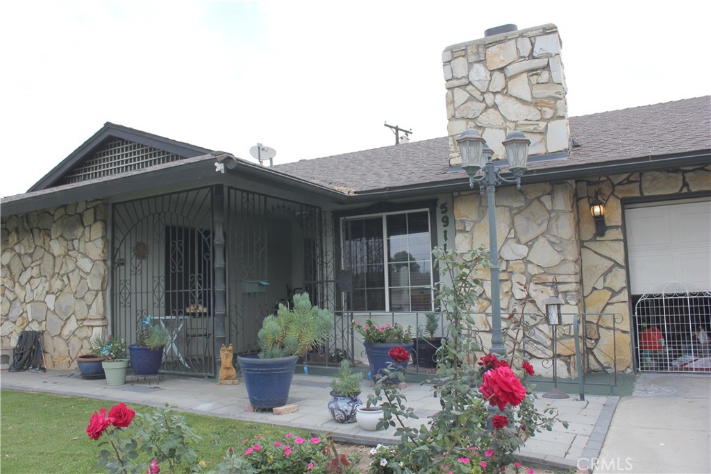 5911 Green Valley Road Riverside, CA 92504 - Photo 1 of 24 a front view of a house