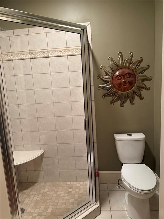 8350 Jacobs Ridge Lane Cumming, GA 30028 - Photo 12 of 68 a bathroom with a toilet and a shower