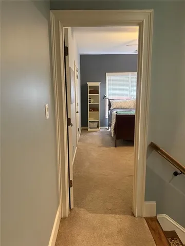 a bathroom with a shower and a sink