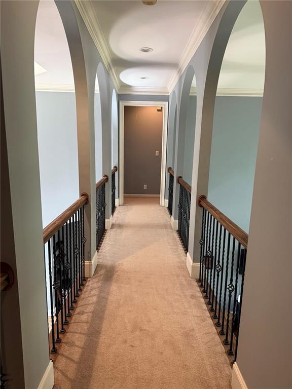 8350 Jacobs Ridge Lane Cumming, GA 30028 - Photo 33 of 68 a view of a hallway with wooden floor and stairs