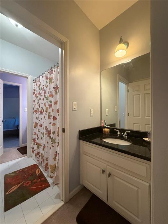 8350 Jacobs Ridge Lane Cumming, GA 30028 - Photo 37 of 68 a bathroom with a shower and a sink