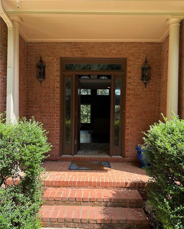 8350 Jacobs Ridge Lane Cumming, GA 30028 - Photo 4 of 68 a view of entrance of the house