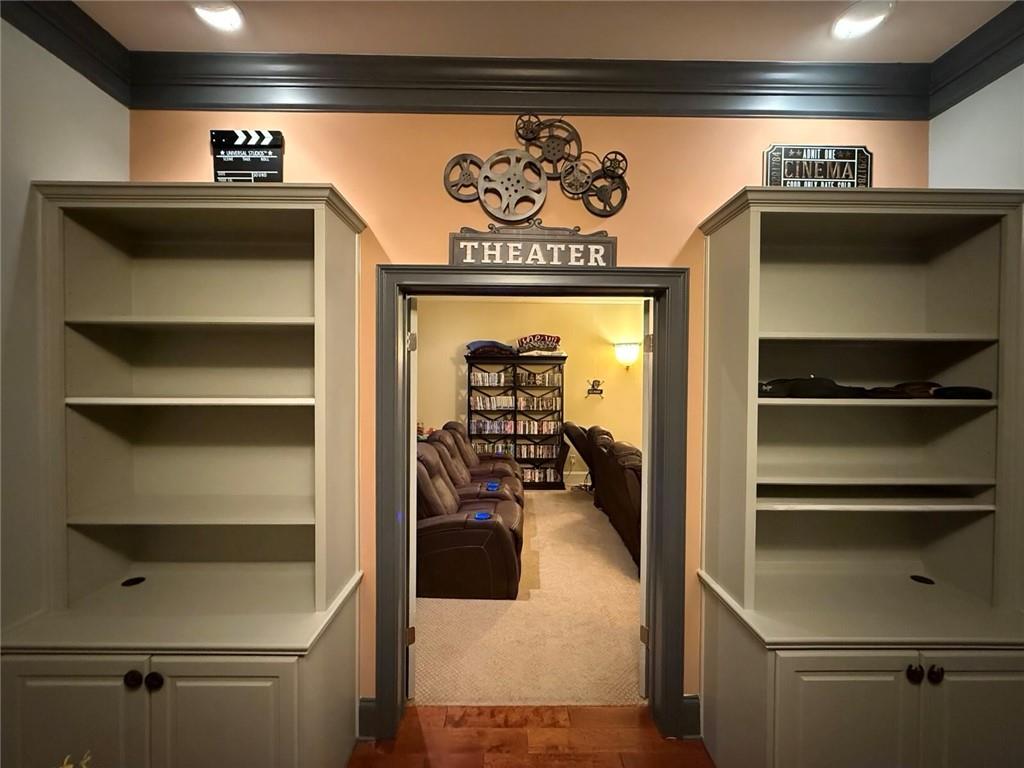 8350 Jacobs Ridge Lane Cumming, GA 30028 - Photo 52 of 68 a view of storage and utility room with washer and dryer