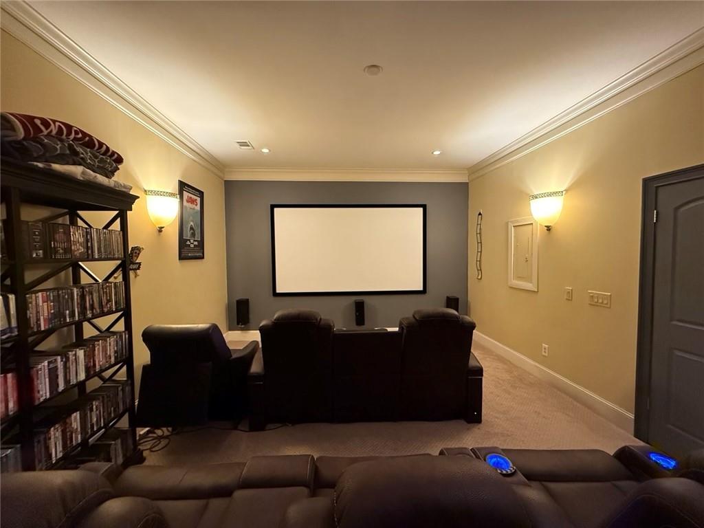 8350 Jacobs Ridge Lane Cumming, GA 30028 - Photo 53 of 68 a living room with furniture and a flat screen tv