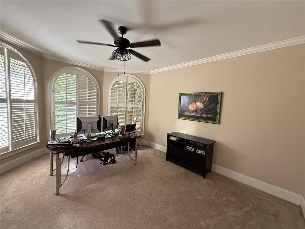 8350 Jacobs Ridge Lane Cumming, GA 30028 - Photo 9 of 68 a living room with furniture and a large window