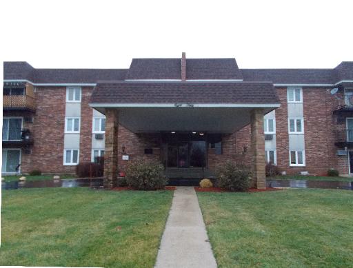 850 South Lorraine Road, Unit 2K Wheaton, IL 60189 - Photo 1 of 9 a front view of house with yard