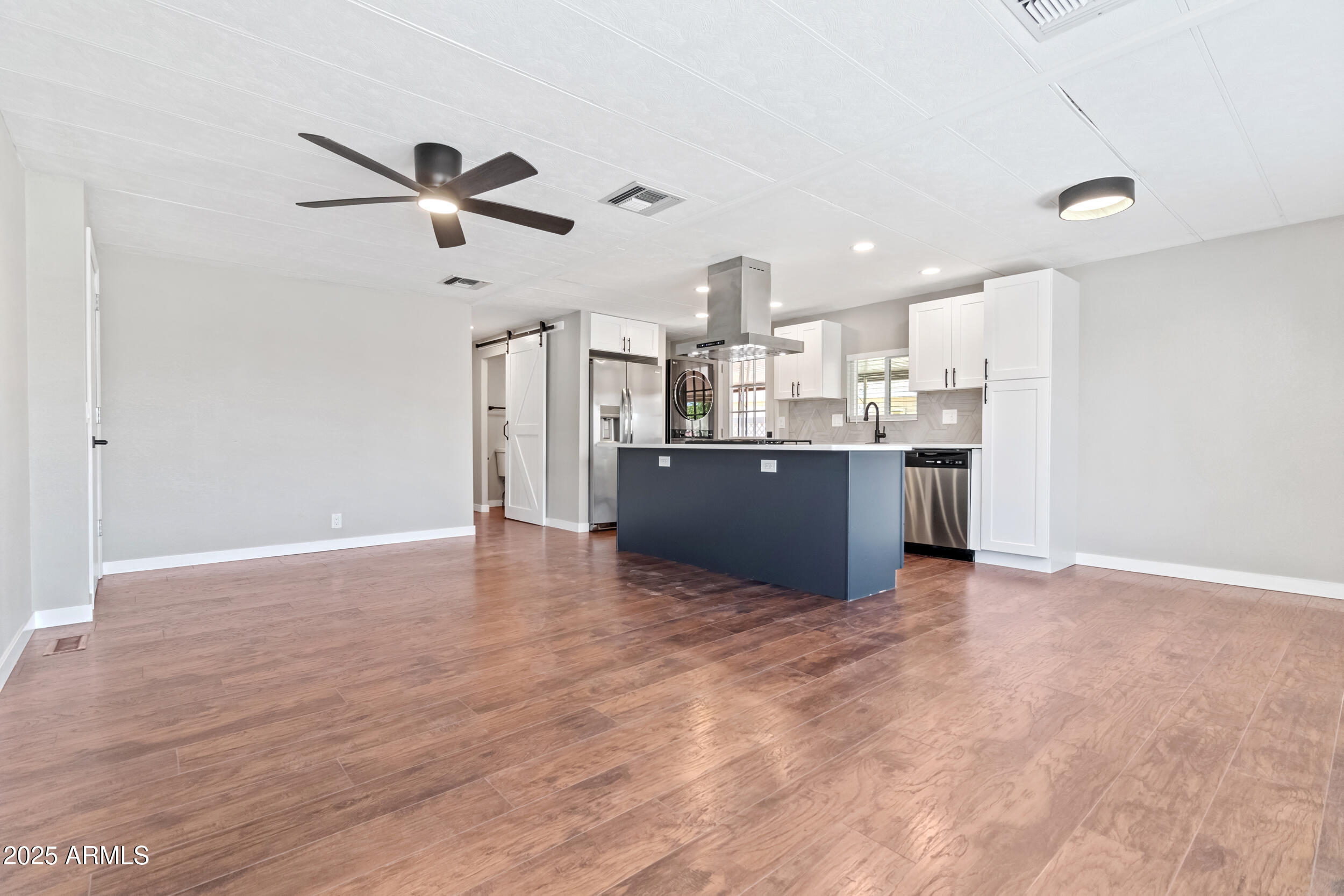 2401 West Southern Avenue, Unit 224 Tempe, AZ 85282 - Photo 15 of 47 a view of a kitchen with a sink and a refrigerator