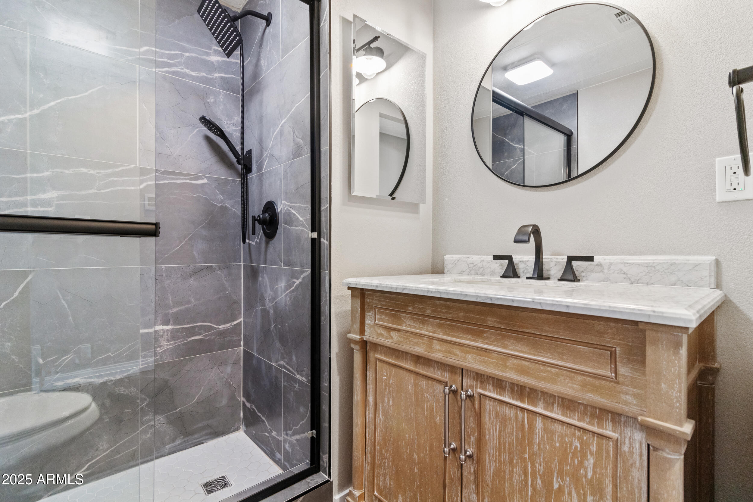 2401 West Southern Avenue, Unit 224 Tempe, AZ 85282 - Photo 20 of 47 a bathroom with a sink a toilet and a mirror